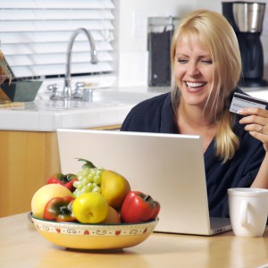 Woman Using Laptop for E-commerce