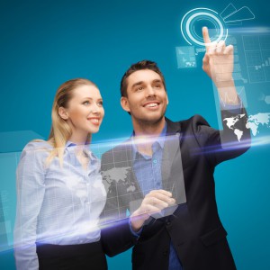 man and woman working with virtual touch screens
