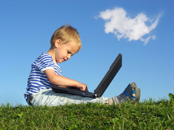 child with notebook sit blue sky with cloud