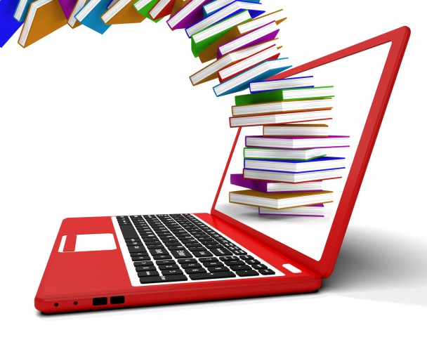 Stack Of Books Flying From Computer Shows Online Learning