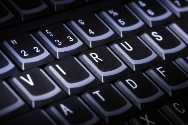 Computer keyboard with word Virus